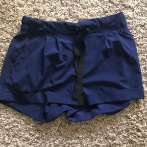 Navy Lululemon athletica shorts - Size 6.